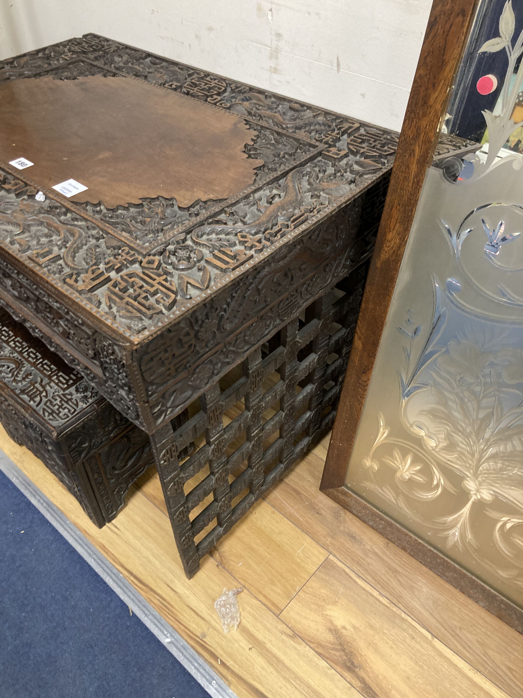 A Chinese carved hongmu folding table, width 83cm depth 56cm height 67cm, and a similar stool/stand, early 20th century